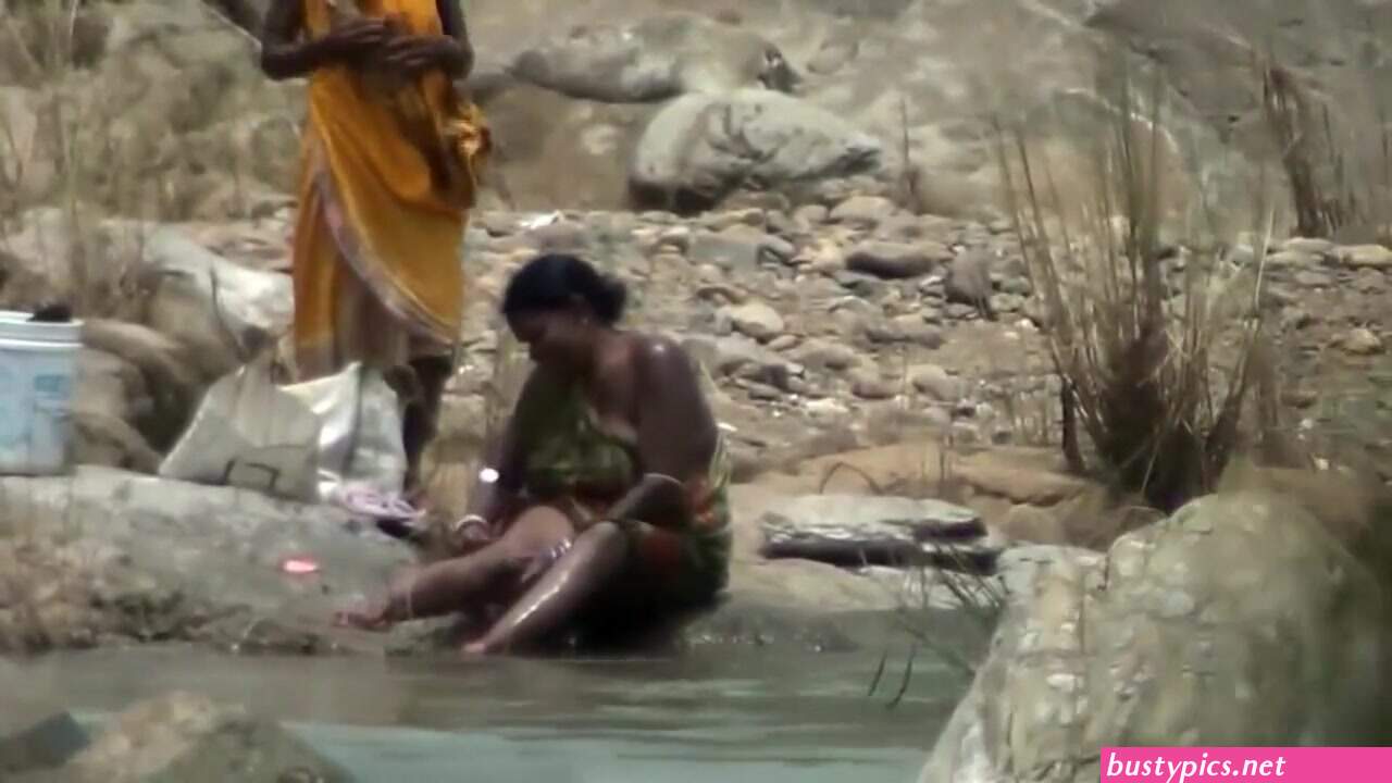 boobs visible in river bath porn video