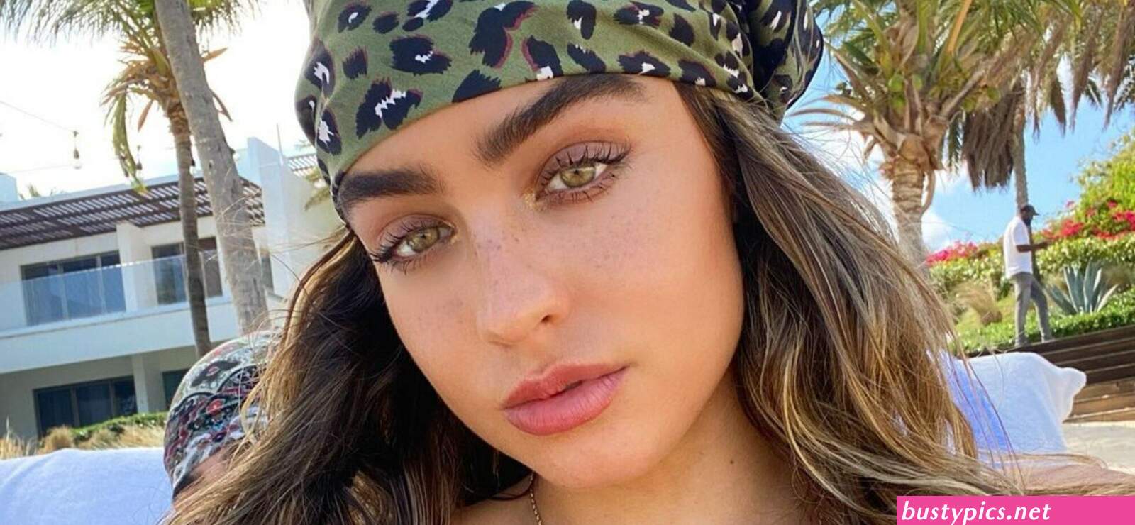 sommer ray shows off her booty in a blue swimsuit