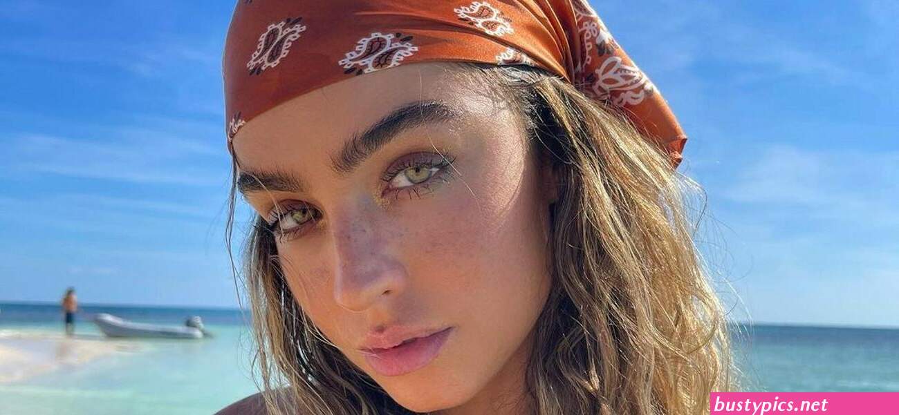 sommer ray shows off her booty in a blue swimsuit