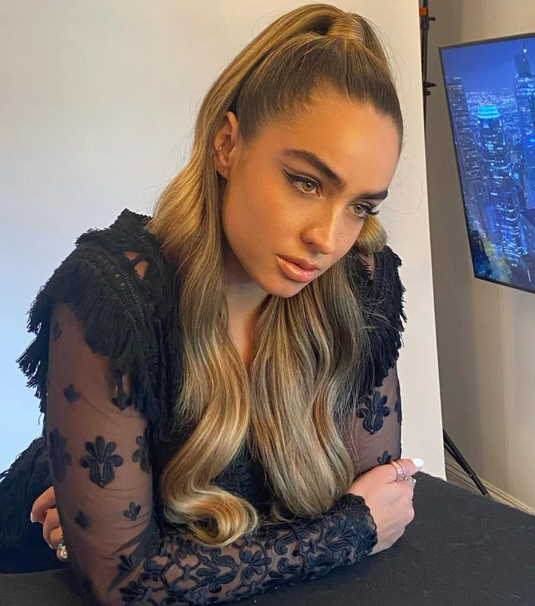 sommer ray shows off her booty in a blue swimsuit