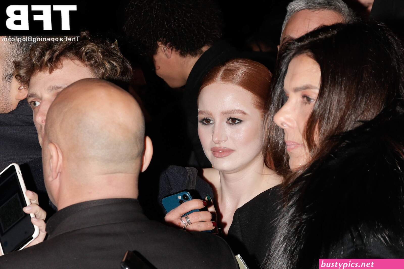 madelaine petsch shows off her nice cleavage during paris fashion week