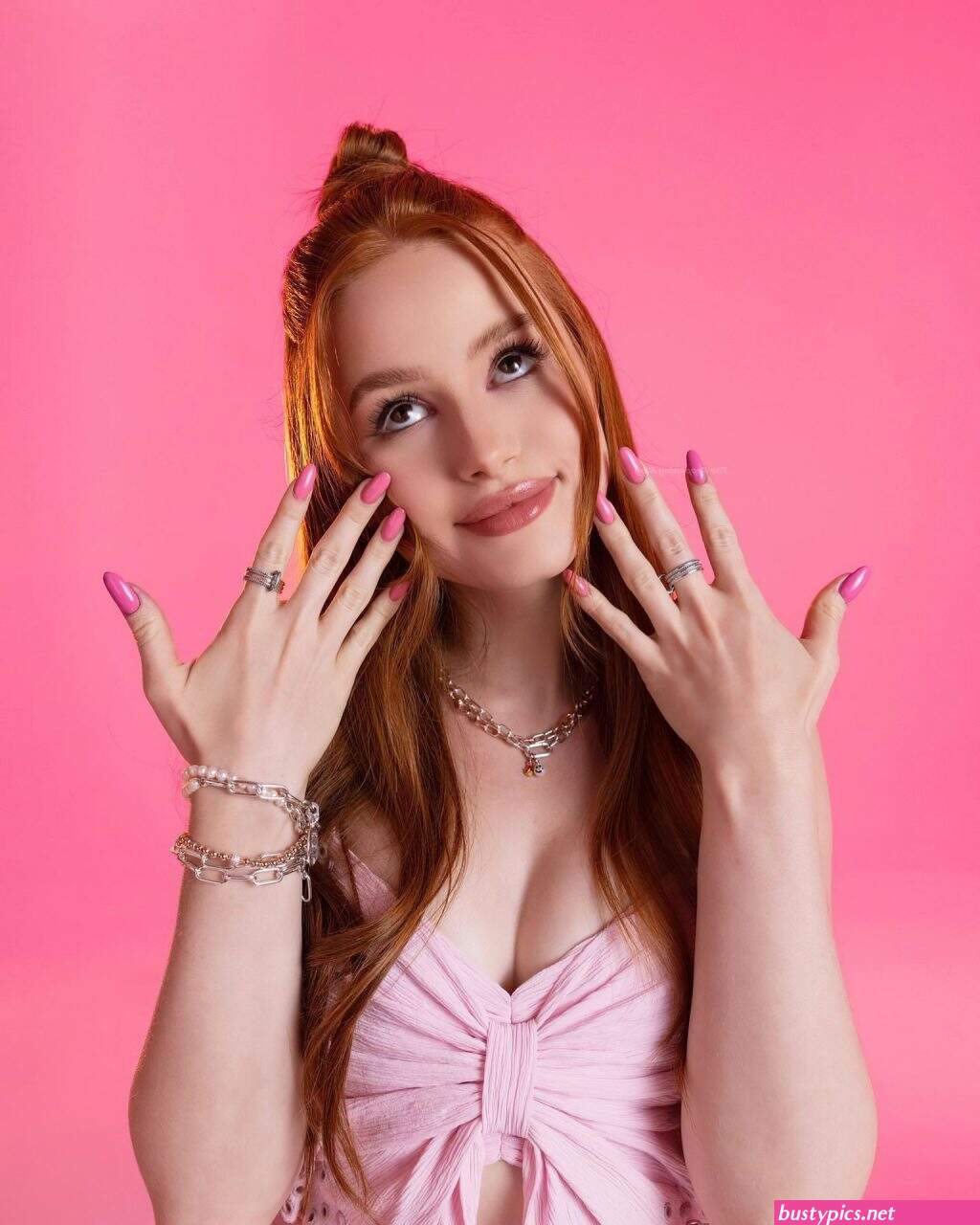 madelaine petsch shows off her nice cleavage during paris fashion week