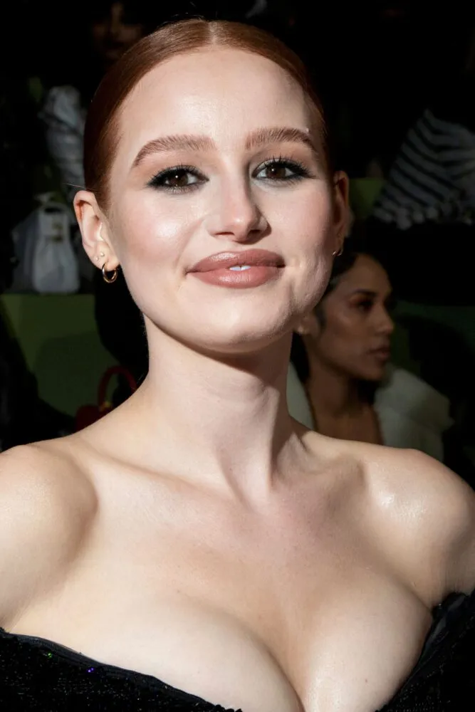 madelaine petsch shows off her nice cleavage during paris fashion week