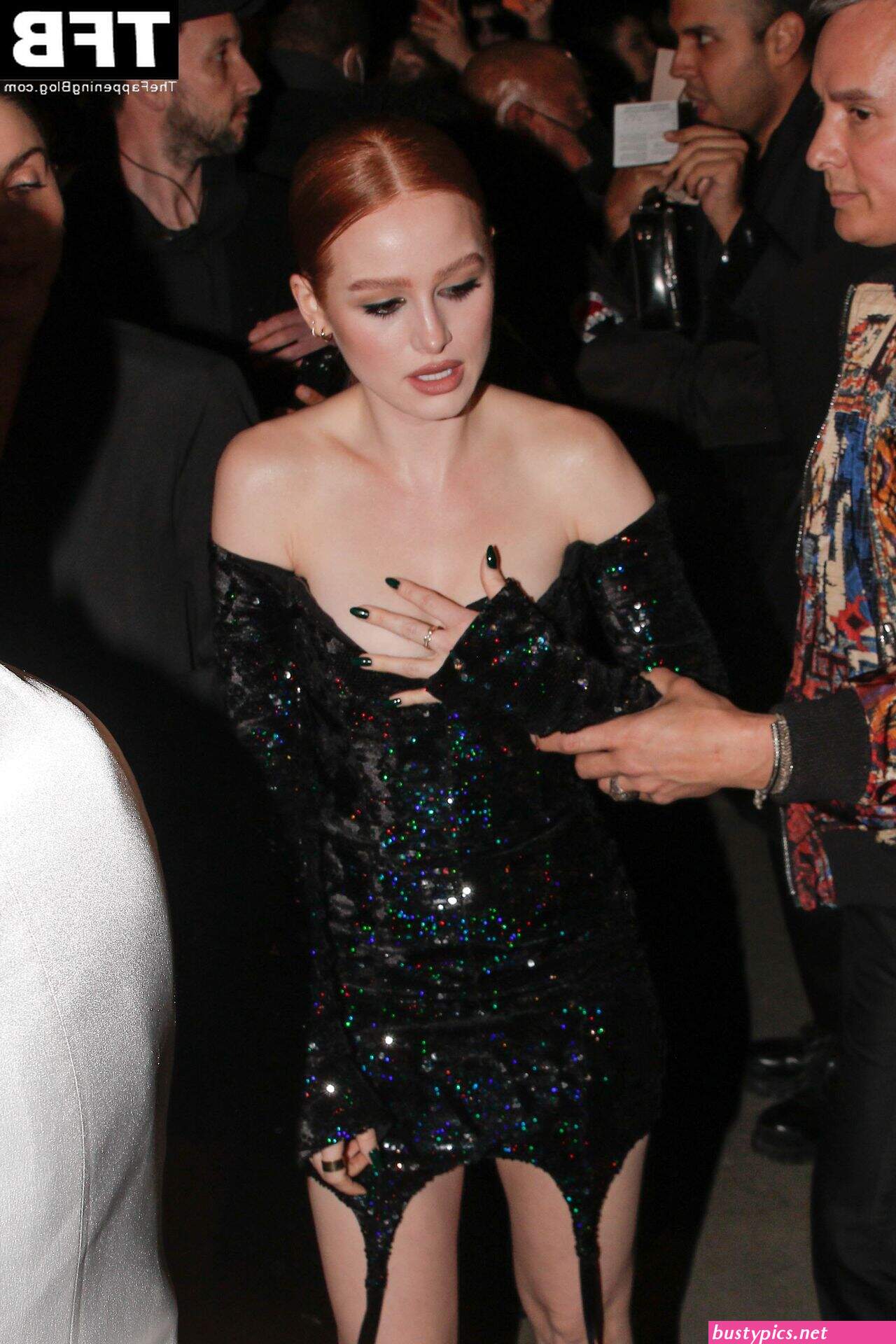 madelaine petsch shows off her nice cleavage during paris fashion week