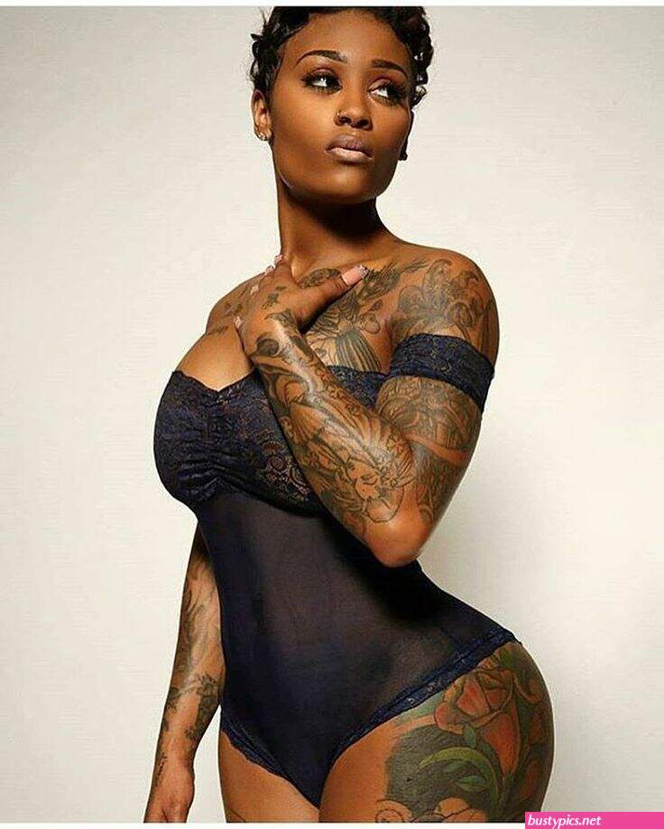 big black tatooed nude gal pic