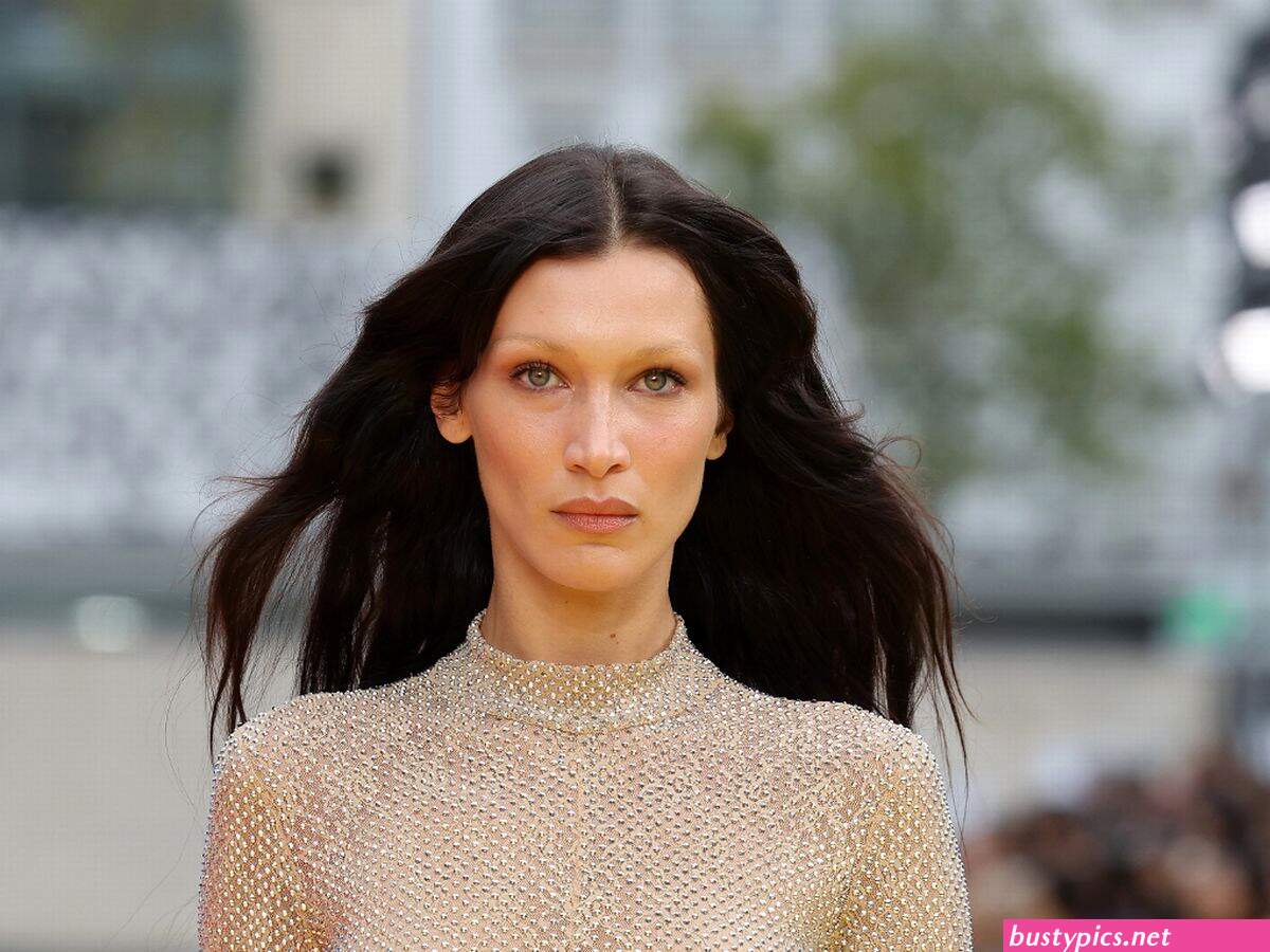 braless bella hadid steps out of the george v hotel with a friend