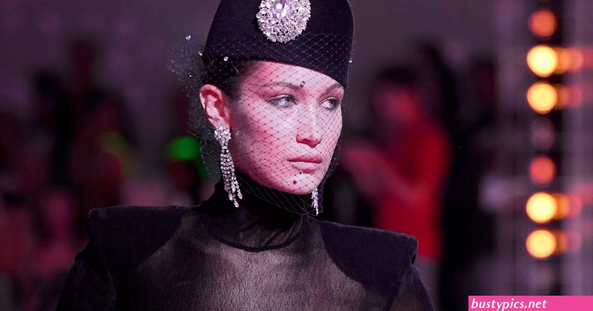 braless bella hadid steps out of the george v hotel with a friend