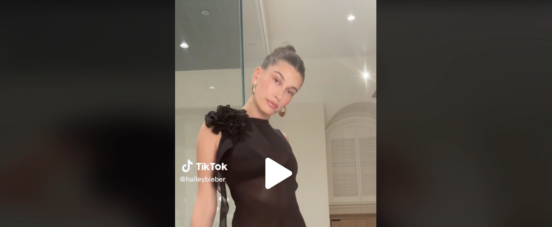 hailey bieber is seen wearing a little black dress