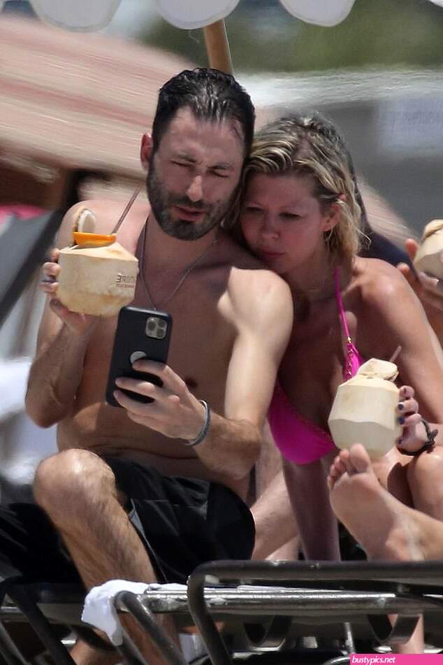 tara reid looks scary in a pink bikini
