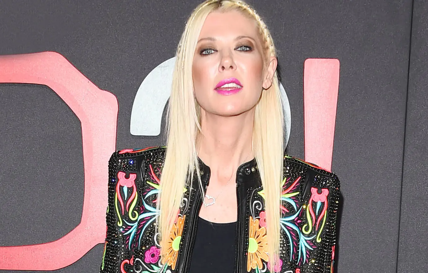 tara reid looks scary in a pink bikini