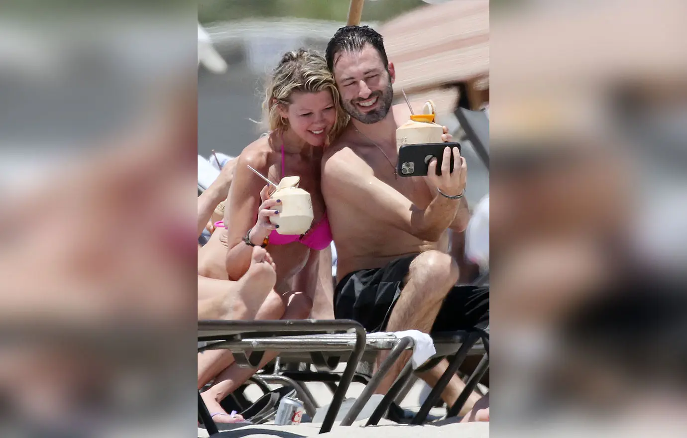 tara reid looks scary in a pink bikini