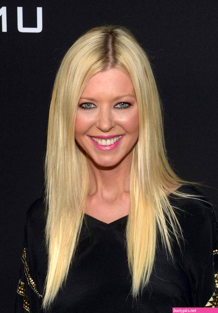 tara reid looks scary in a pink bikini
