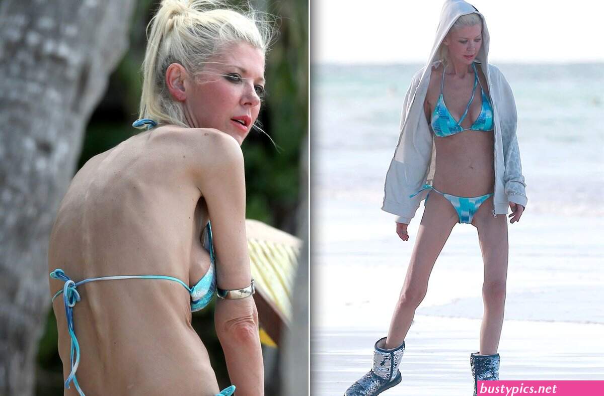 tara reid looks scary in a pink bikini