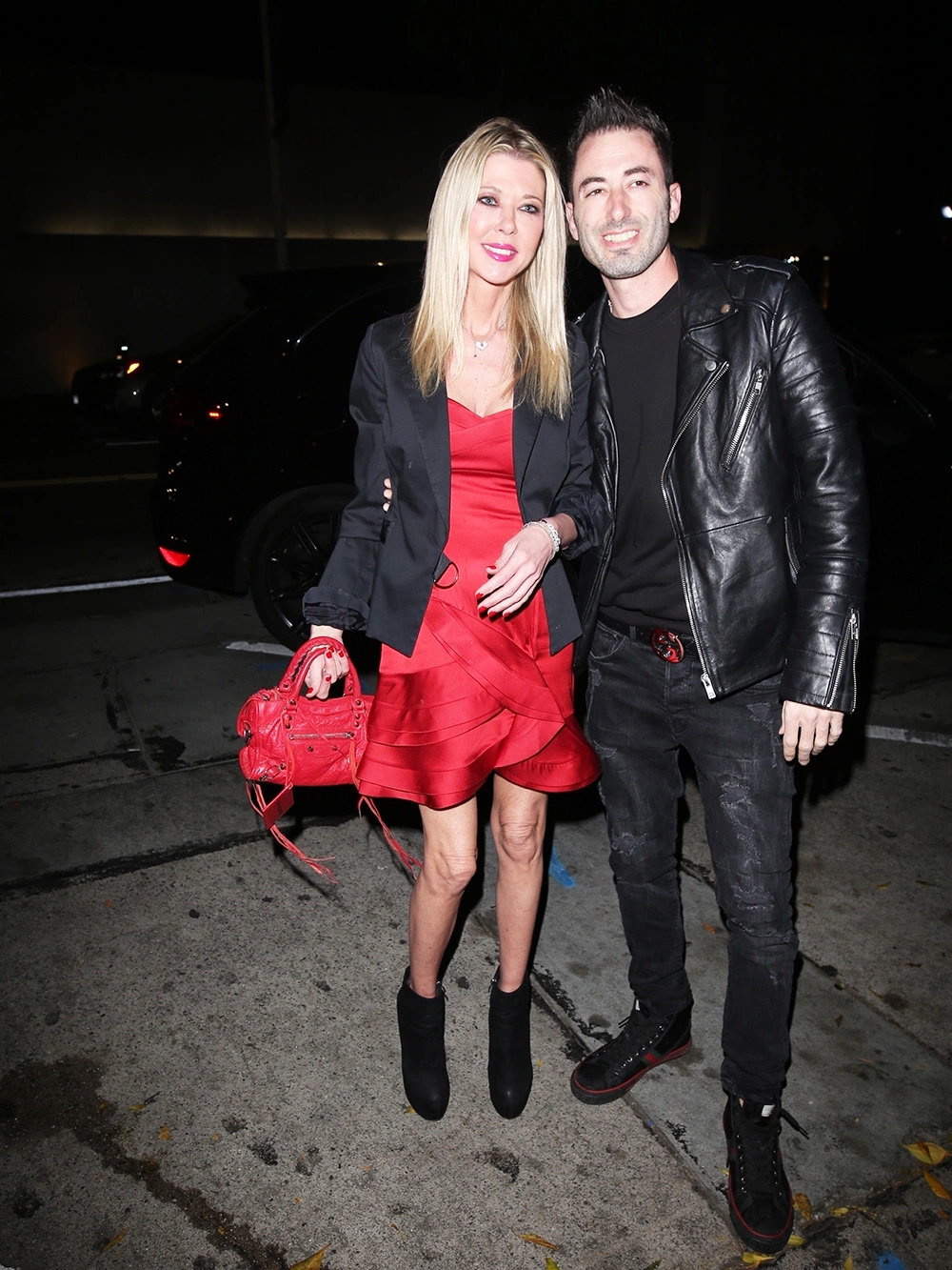 tara reid looks scary in a pink bikini