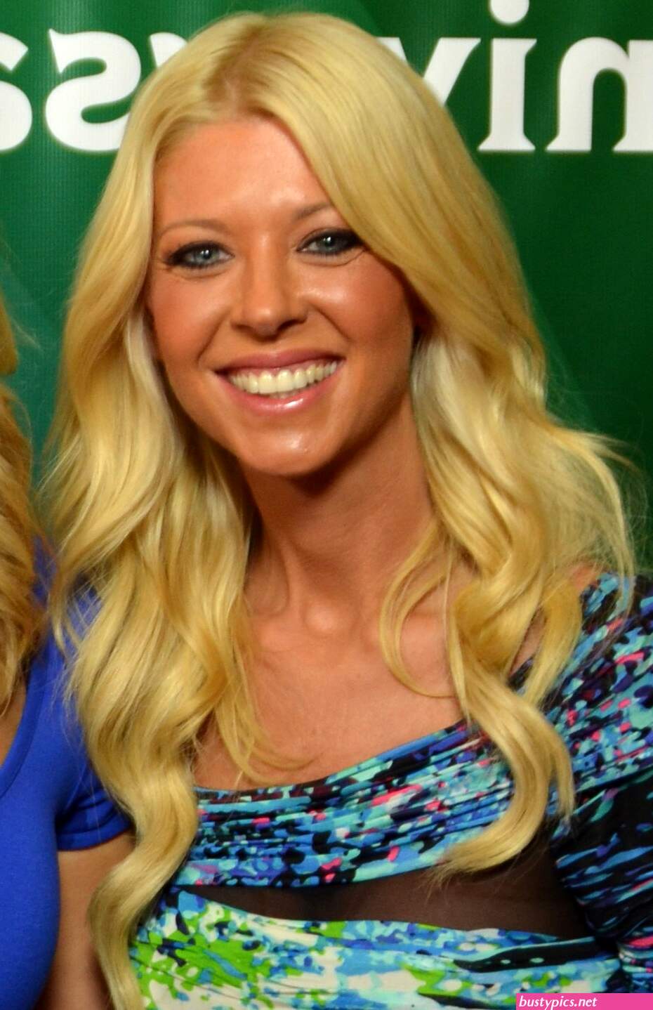 tara reid looks scary in a pink bikini