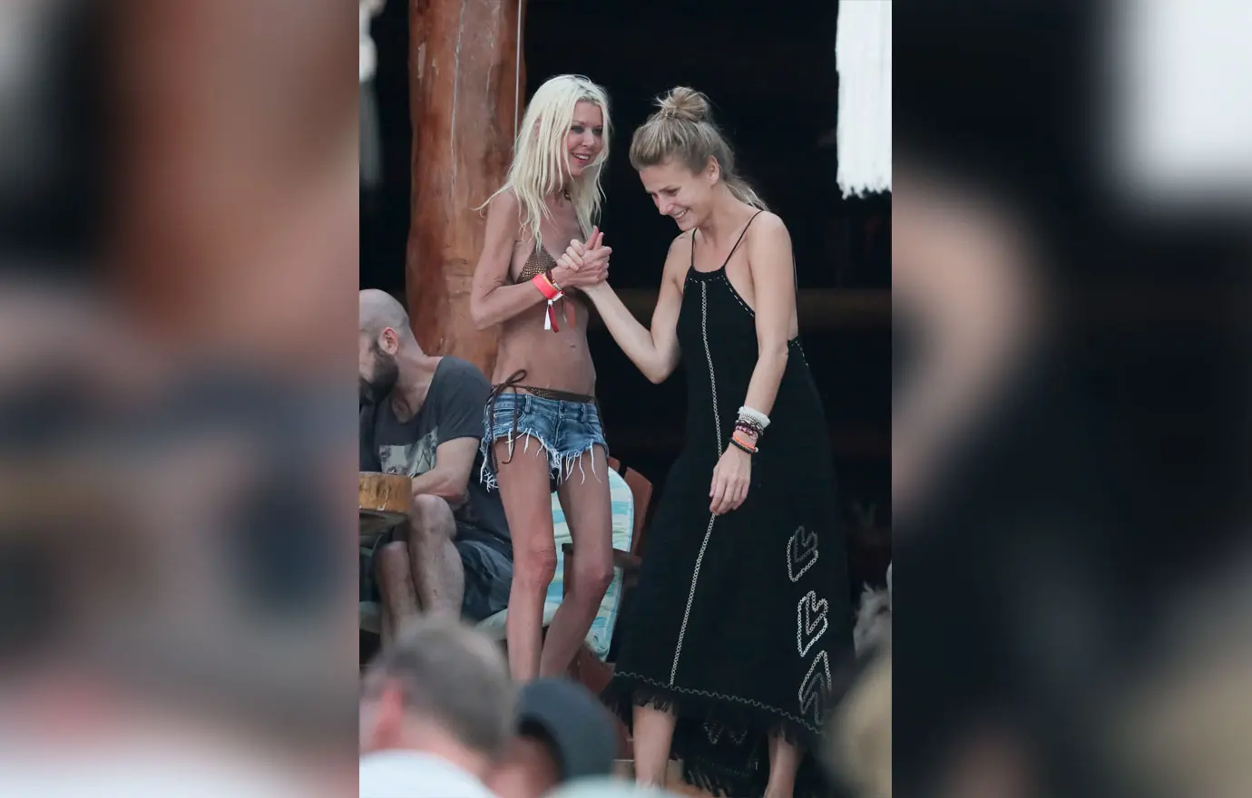 tara reid looks scary in a pink bikini