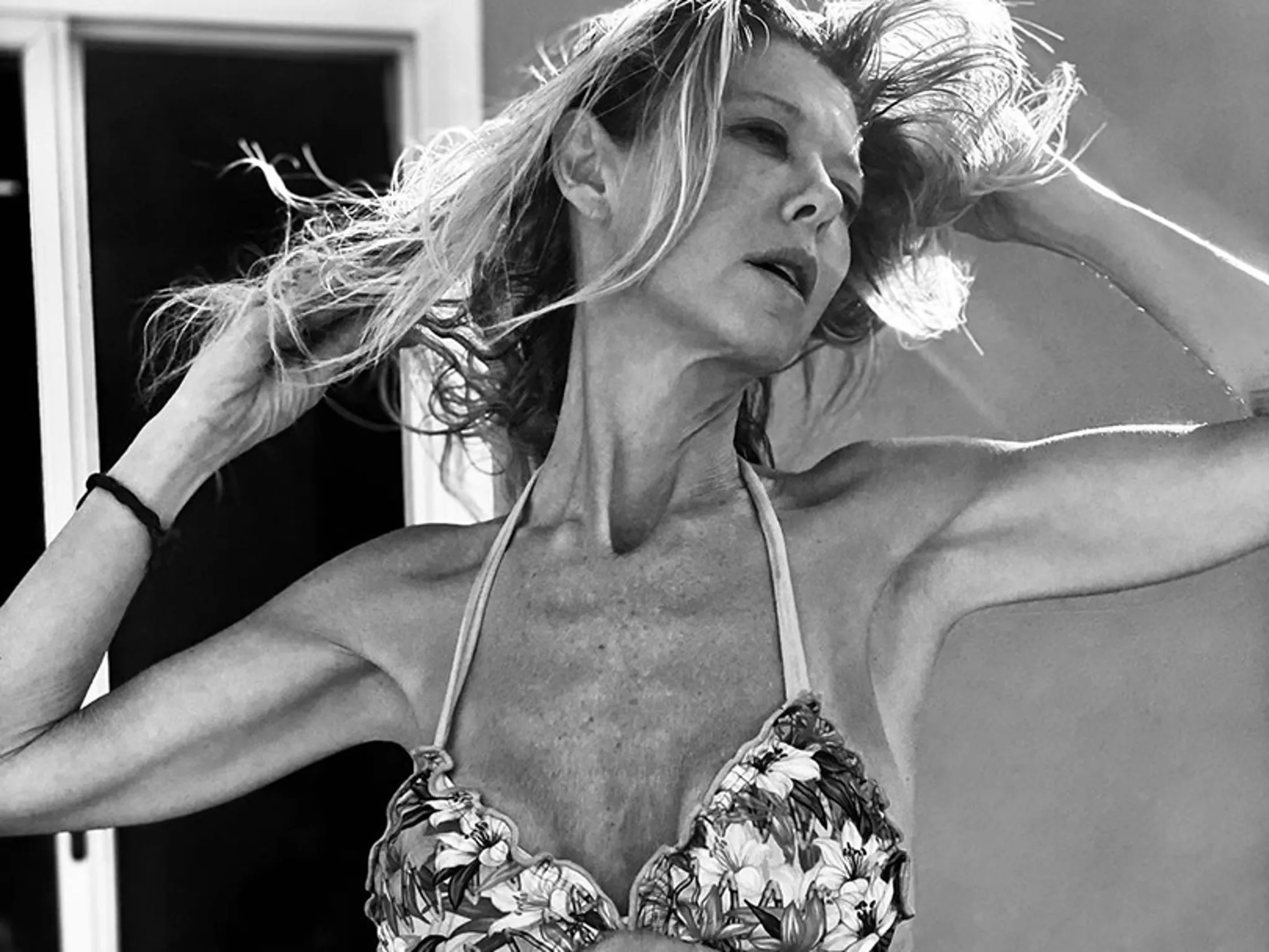 tara reid looks scary in a pink bikini